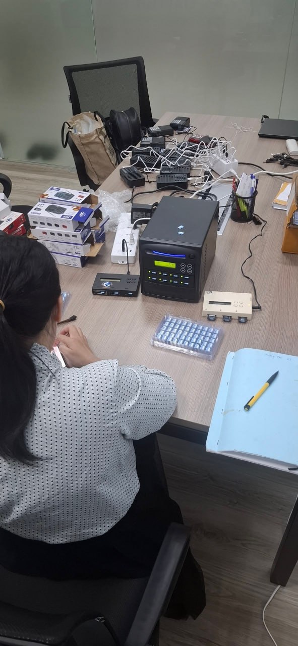 Preparing — duplicating memory cards for 500 audio players.